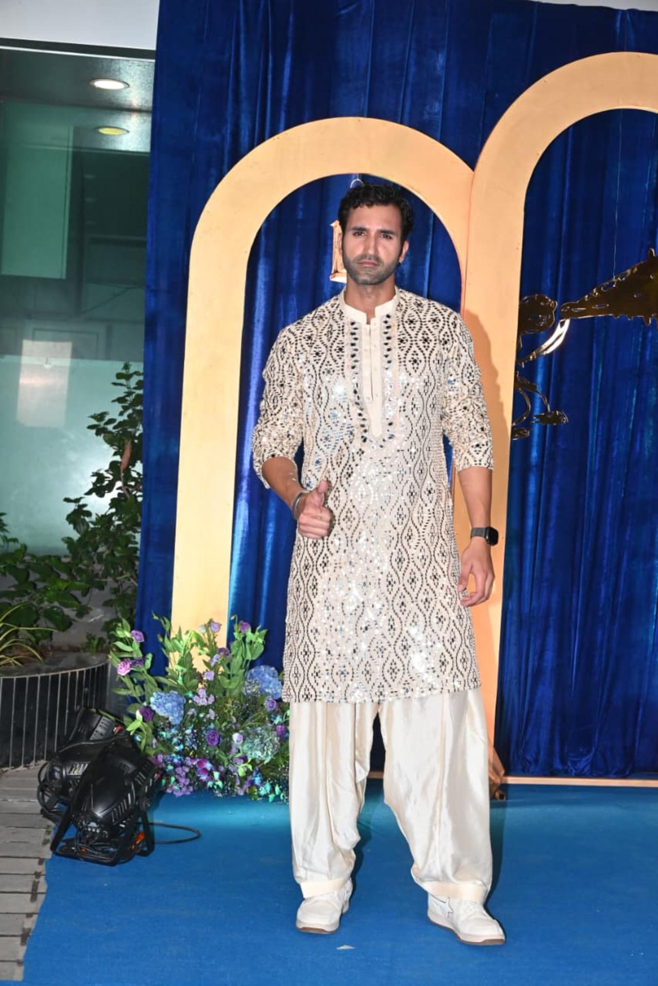 Gurfateh Pirzada looked handsome as he arrived at the celebration in off-white Kurta set with silver embroidery on it.